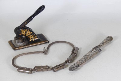 Lot 506 - An Argentinian knife, having a repoussee...