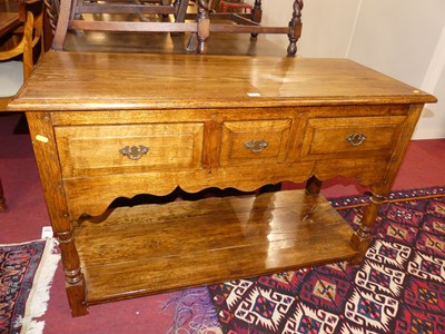 Lot 1403 - A contemporary joined oak three drawer...