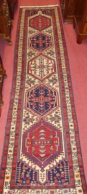 Lot 1406 - A Turkish kilim woollen cream red and blue...