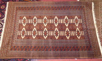 Lot 1412 - A Turkish woollen cream, blue and red ground...
