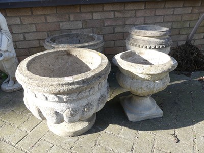 Lot 1421 - A pair of reconstituted stone pedestal garden...