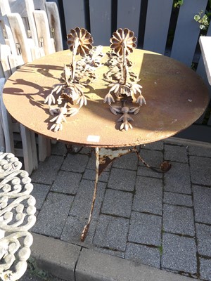 Lot 1437 - An iron circular garden patio table, dia. 76cm,...