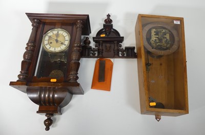 Lot 564 - A continental oak cased wall clock having a...