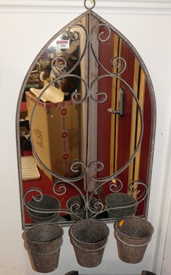Lot 584 - A modern wall mounted planter having a painted...