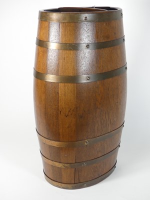 Lot 607 - A large copper coopered oak stickstand of...