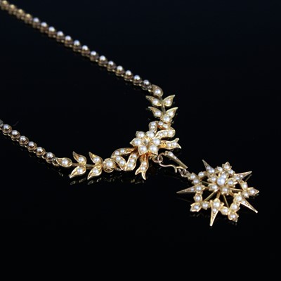 Lot 2039 - An early 20th century yellow metal and pearl...
