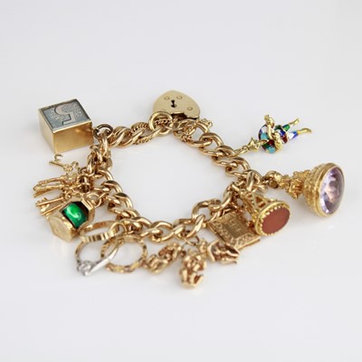 Lot 2046 - A 9ct yellow gold filed curblink bracelet with...