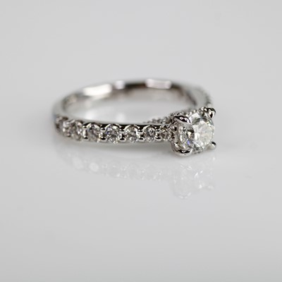 Lot 2047 - A platinum diamond solitaire ring, featuring a...