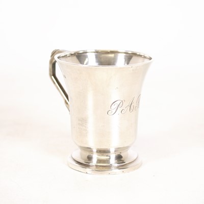 Lot 261 - An Art Deco silver christening mug, having a...