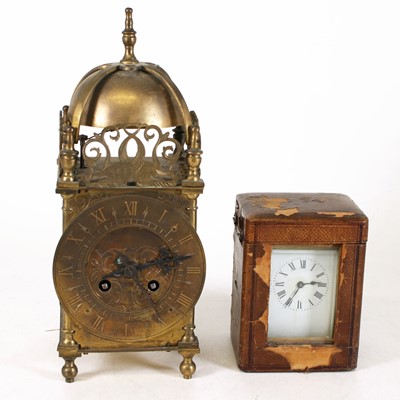 Lot 70 - An early 20th century brass lantern clock, in...