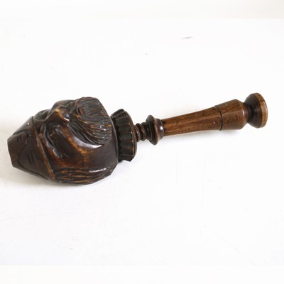 Lot 296 - A Swiss carved and stained softwood figural...