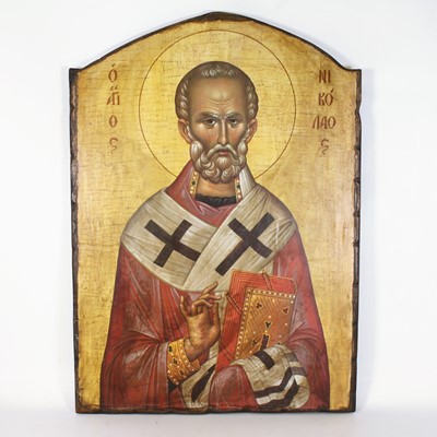Lot 450 - A reproduction orthodox Russian icon of St...