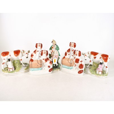 Lot 58 - A collection of five Staffordshire figures, to...