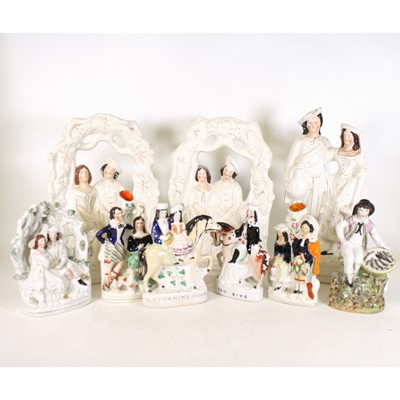 Lot 96 - A collection of nine Staffordshire figures, to...