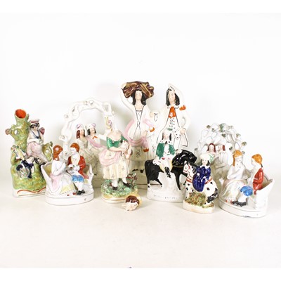 Lot 94 - A collection of ten Staffordshire figures, to...