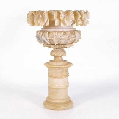 Lot 21 - An Italian carved alabaster jardinere, relief...