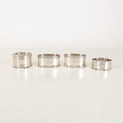 Lot 261 - A pair of mid-20th century silver napkin rings,...