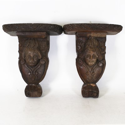 Lot 32 - A pair of oak brackets, 18th century and later,...