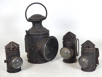 Lot 178 - An early 20th century black painted tin oil...