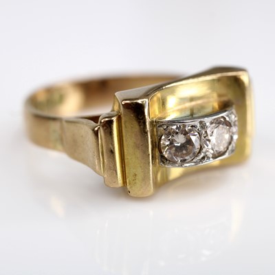 Lot 2051 - A 9ct yellow and white gold diamond abstract...