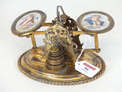 Lot 86 - A pair of English gilt pierced brass and...