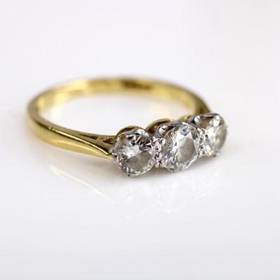 Lot 2055 - An 18ct yellow and white gold diamond ring...