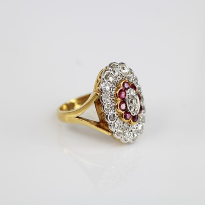 Lot 2071 - An 18ct yellow and white gold ruby and diamond...