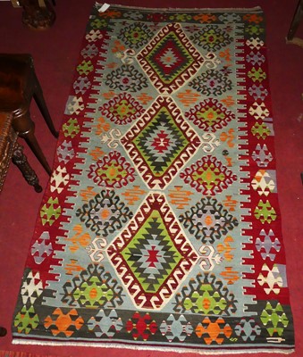 Lot 698 - An Anatollian Denizili Kelim rug, with three...