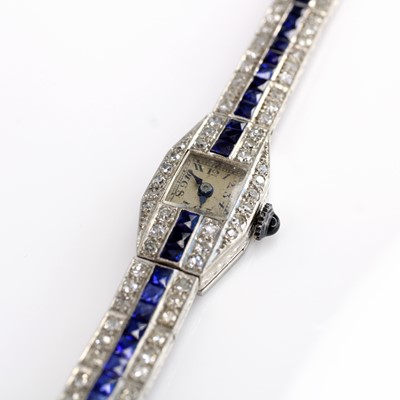 Lot 2085 - A white metal lady's diamond cocktail watch...