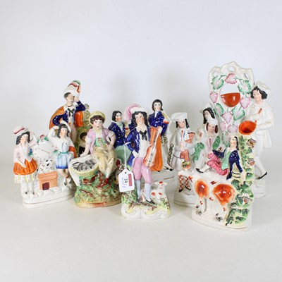 Lot 24 - A collection of eight Staffordshire pottery...