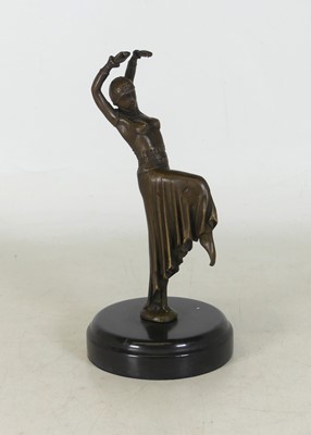 Lot 63 - A reproduction bronzed metal figure of a...