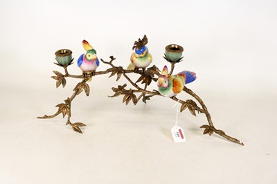Lot 110 - A porcelain mounted gilt metal two branch...