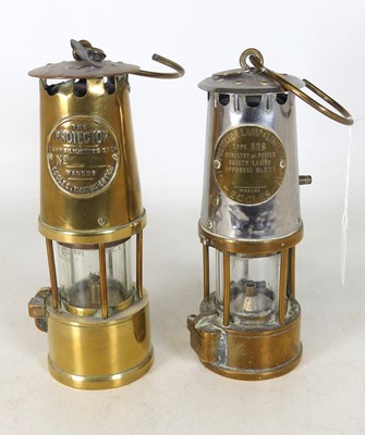 Lot 228 - A 20th century miner's lamp of typical form...