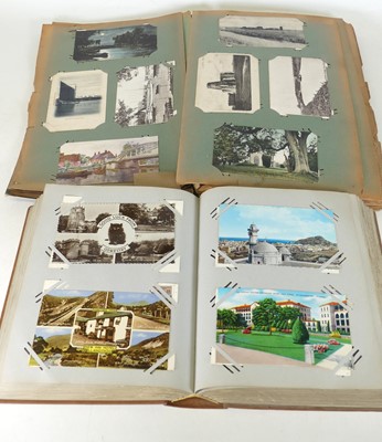 Lot 230 - An Edwardian postcard album, the contents...
