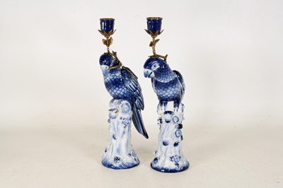 Lot 135 - A pair of reproduction continental porcelain...