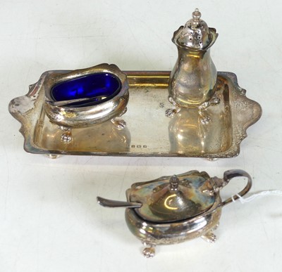 Lot 235 - A George V four piece silver cruet set,...