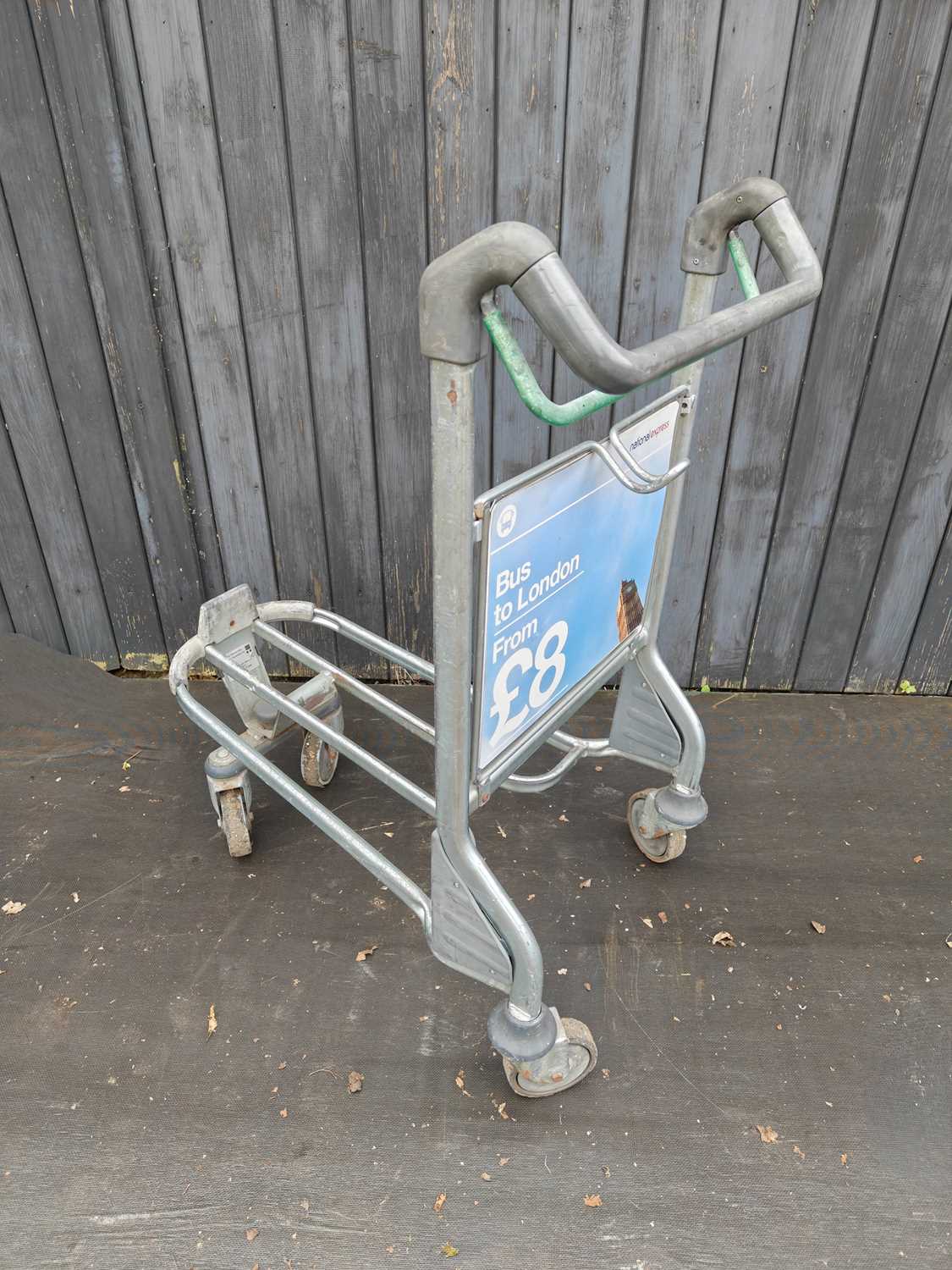 Lot 41 - An airport luggage trolley, being a London...