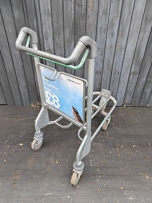 Lot 41 - An airport luggage trolley, being a London...