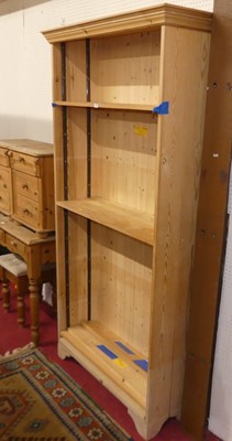 Lot 544 - A pine freestanding open bookshelf, h.195cm, w....