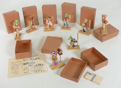 Lot 234 - A collection of bamboo novelty placecard...