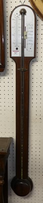 Lot 549 - A reproduction mahogany stick barometer with...