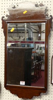 Lot 508 - A Chippendale style mahogany fret carved wall...
