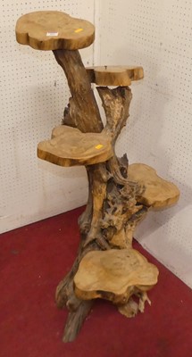 Lot 493 - A root carved five tier plant stand, h.107cm
