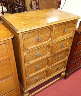 Lot 538 - A Jacobean style moulded oak chest having two...