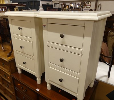 Lot 540 - A pair of modern white painted three-drawer...
