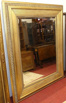 Lot 546 - A late Victorian carved oak settle with three...