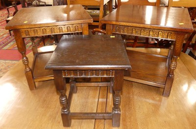 Lot 581 - A pair of reproduction oak two-tier occasional...