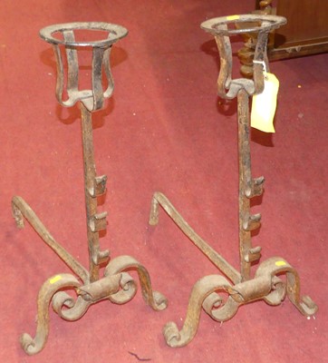 Lot 584 - A pair of wrought iron fire dogs, probably...