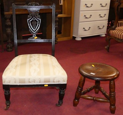 Lot 622 - A late Victorian carved and ebonised nursing...