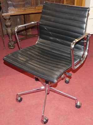 Lot 618 - After Charles & Ray Eames - a chrome and black...
